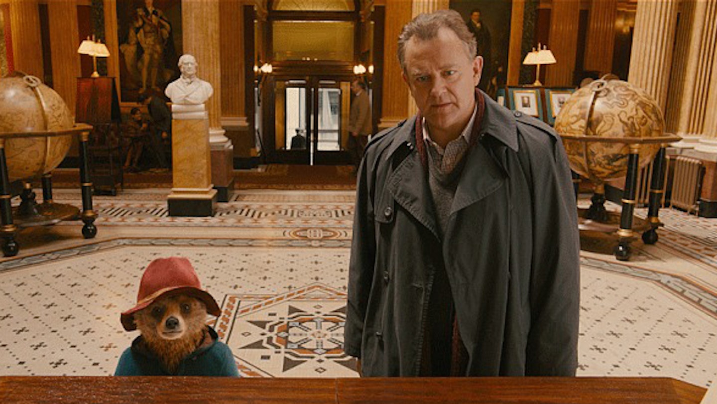 Paddington bear and Hugh Bonneville in Paddington