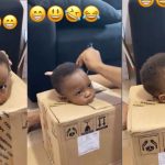Children will test you - Video trends as father placed his son inside a carton while barbing for him (Video)